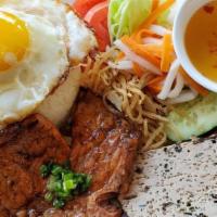 C11-Cơm Tấm Sườn Đặc Biệt · Broken rice with pork chop,  

shredded pork ,Egg quiche & egg.