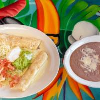 Flautas (2) · Two flour tortillas rolled and stuffed with chicken and then deep-fried served with guacamol...