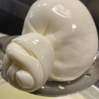 Side Of Burrata- · Artisanal hand tied burrata, packed in whey. Perfect compliment to pizza, salad, or beautifu...