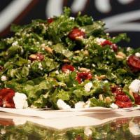 Kale Salad · Kale, carrots, purple cabbage, sunflower seeds, dried cranberries, goat cheese, and poppy se...