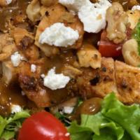 Candied Waldorf Salad · Fresh greens, creamy goat cheese, cherry tomatoes, candied walnuts with blackened chicken an...