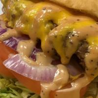 The Food Truck · This is our classic cheeseburger. 1/2lb juicy patty, cheese, lettuce, tomato, and onion topp...