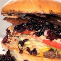 Bacon Jam Burger · This patty is topped with our house-made, savory bacon jam, followed by melted cheese, lettu...