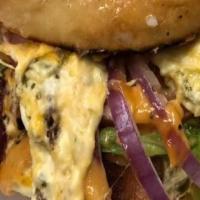 Jalapeno Popper Burger · Cheddar Cheese Jalapeno Popper Filling melted over 1/2 lb burger patty and topped with lettu...