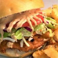 Deep Fried Halibut Burger · Alaskan caught halibut deep-fried with melted Cheddar, house coleslaw, lettuce, tomato, onio...