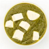 Saag Paneer · Fresh spinach cooked with cheese cubes and touch of cream