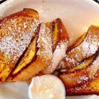 French Toast · With soft butter and syrup