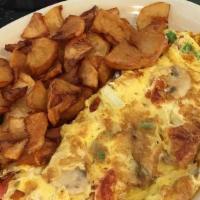 Garden Omelette · Peppers,onions,tomatoes and mushrooms.
Served with homefries and toast