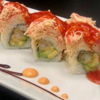 Sweet Shrimp Roll · Shrimp tempura, shrimp, and avocado topped with spicy kani and spicy sauce.