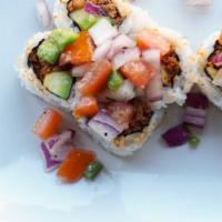 La Chaparra Roll · Chorizo and avocado topped with pico de gallo.