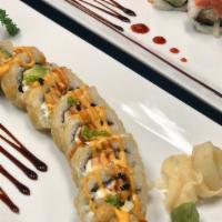 Samba · A deep fried roll with salmon, cream cheese, avocado, and tobiko topped with spicy mayo and ...