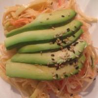 Kani Salad · Kani and cucumber tossed with spicy sauce, masago and scallion, finished with fresh sliced a...