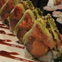 New Dragon Roll · Inside: salmon and yellowtail. Outside: spicy tuna, avocado and eel sauce.