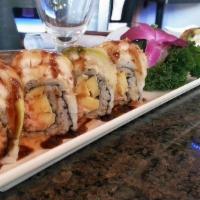 State Street Roll · Inside: lump crab with Japanese mayo, mango and masago. Outside: cream cheese, white tuna te...