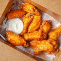 Homemade Wings · Baked in our own secret marinade and finished off in the air fryer to order.