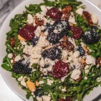 Arugula Salad · Mixed greens, arugula, goat cheese, berries, walnuts &  almonds