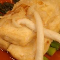 Agedashi Tofu · Deep fried organic tofu, mushroom and asparagus in light fish broth topped with dried bonito...