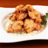 Tari No Karaage · Japanese style fried chicken, battered with ginger and garlic. Served with mustard sauce