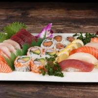Sushi & Sashimi Combo · Assortment of 9 sashimi, 6 nigiri, spicy tuna roll and california roll