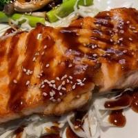 Salmon Teriyaki With Rice · Broiled to perfection, then smothered in our own special teriyaki sauce. Served with broccol...