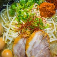 Spicy Tonkotsu Ramen · Spicy. Our classic Tonkotsu ramen made spicy (Pork Broth). Thick noodle. Topped with pork sh...