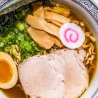 Tokyo Style Ramen · Our pork and chicken broth made shoyu style, topped with slow-cooked chashu, naruto (fish ca...