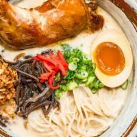Chicken Ramen · Rich chicken broth topped with chicken thigh, soft boiled egg, scallion, wood ear, and pickl...