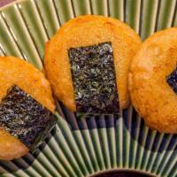 Cheese Mochi · Savory mochi stuffed with a cheese blend, wrapped in nori, and sizzled in umami sauce.