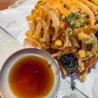 Kaiju Nest Tempura · Our delectable take on the classic tempura! A mix of vegetables (Onion, Purple Potato, Butte...