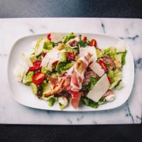 Insalata Antipasta · chopped romaine, tomato, roasted peppers, artichoke hearts, olives, baby fresh mozzarella, s...