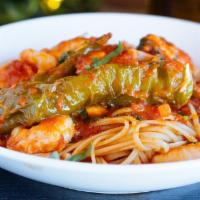 Shrimp & Crab Meat Fra Diavolo · sautéed shrimp and crab in a spicy marinara over linguine