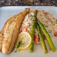 Bronzino · european seabags, parmesan risotto with cherry tomato, sweet peas, grilled asparagus, topped...