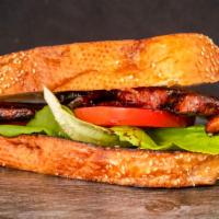 Butcher'S Blt · Hand cut, candied porky belly, lettuce, tomato, mayo, on butter toasted bread.