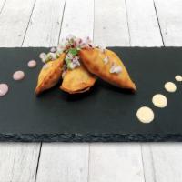 Empanadas (3) · House made choice of steak or chicken. Served with Sarza Criolla.