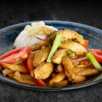 Pollo Saltado · Tender chicken sautéed in olive oil with onions and tomatoes. Served over french fries and ...