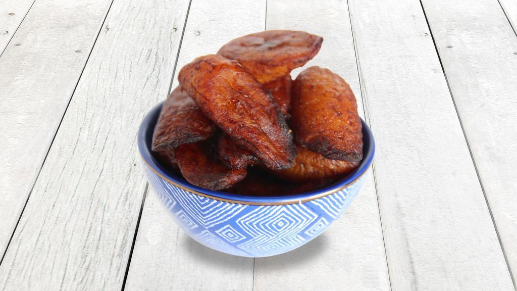 Fried Plantains · Ripe plantains gently fried to perfection.