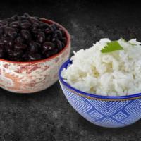 White Rice & Black Beans · Secret recipe House made black beans over our garlic scented jasmine rice.