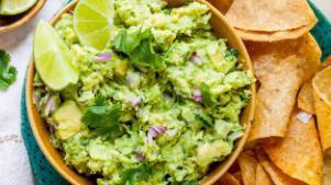 Tortilla Chips & Guacomole · Vegetarian. Tortilla chips fried to a golden crisp, served with freshly house-made guacamole.