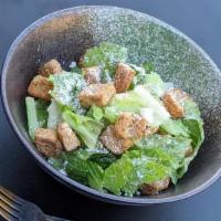 Roasted Garlic Caesar Salad · Crisp romaine lettuce tossed in our roasted garlic Caesar dressing. topped with parmesan che...