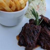 Bbq Marinated Steak Tips · Half pound marinated steak tips, based with our house BBQ, hand-trimmed and fire-grilled to ...