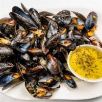 Mussels Margueray · Steamed in Garlic Butter, Wine & Spices