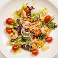 Grilled Mediterranean Salad · Greek olives, feta, artichokes, red onions, grape tomatoes, mixed greens, tossed in balsamic...