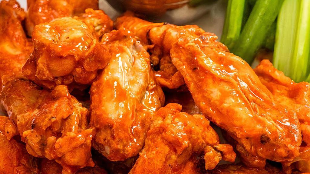 Wings (20 Pieces) · 10 pieces (comes with one dressing), 15 pieces (comes with two dressings), 20 pieces (comes with two dressings).