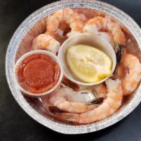 12 Pc. Extra Jumbo Cocktail Shrimp, Peeled, Tail On, W/Cocktail & Lemon Wedge · Served with Cocktail Sauce and Lemon Wedge