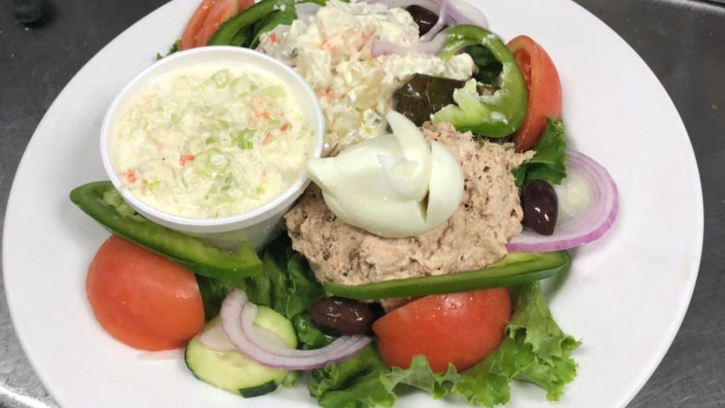 Grilled Chicken Salad · Over mixed green salad. Served with a cup of soup and choice of dressing.