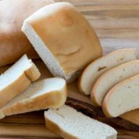 Coco Bread · Freshly baked buttered roll. Serves 1