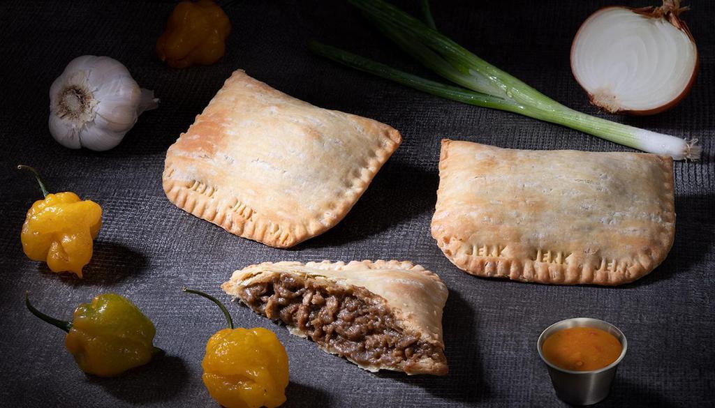 Jerk Chicken Pattie · Jerk chicken made with our signature sauce in a flaky turnover. Serves 1
