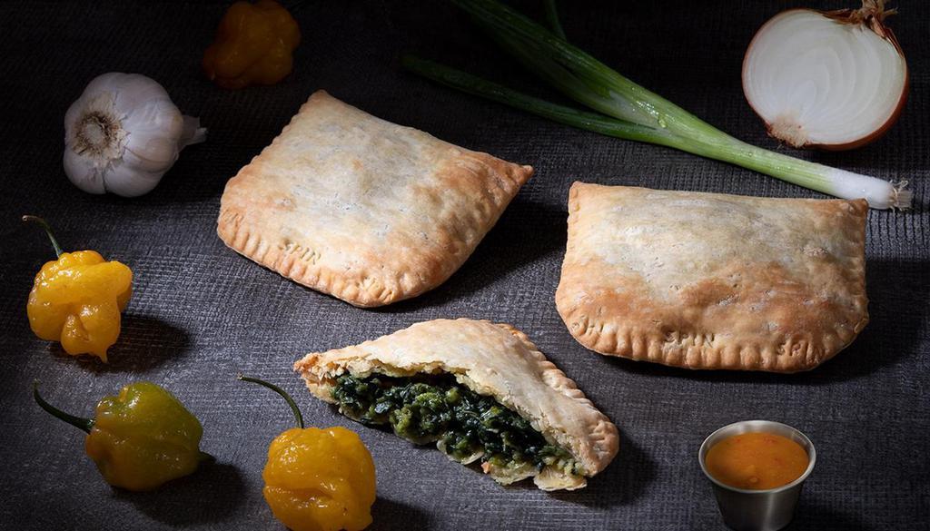 Spinach Pattie · Seasoned spinach in a flaky turnover. . Vegan.