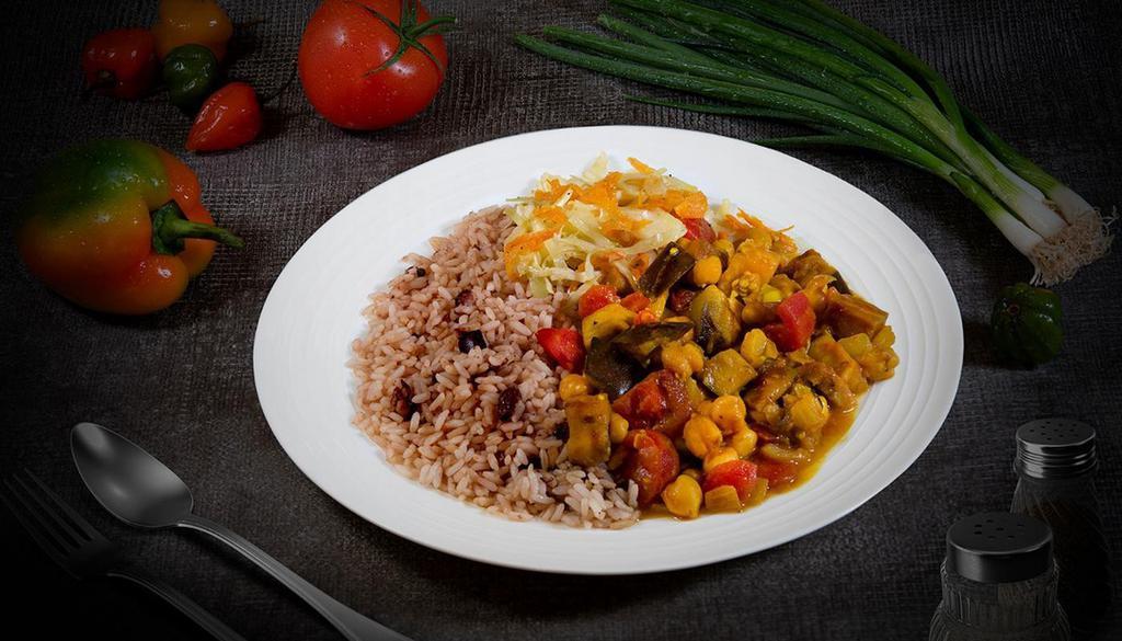Curried Vegetables · Garbanzo beans (chickpeas), eggplant, stewed tomatoes in our special curry blend, on rice & peas and cabbage.