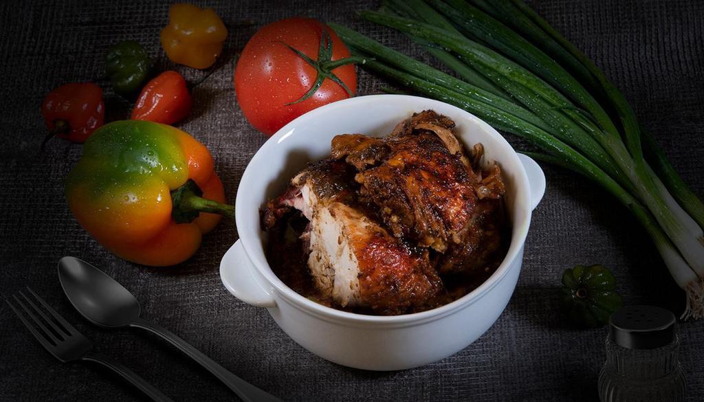 1Lb Jerk Chicken · Jerk chicken made with our signature spices and sauce.. *little more than 1/2 chicken